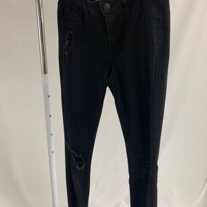 Black skinny jeans with rips